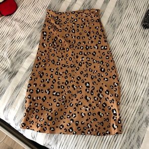 Frame hugging satin midi skirt